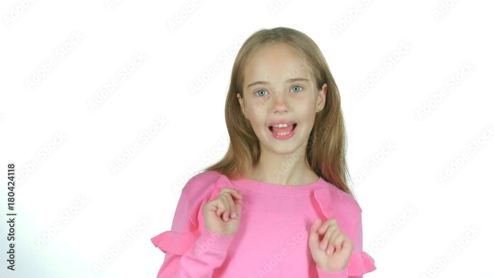 Child girl is making faces. White background Child girl is making faces. White background