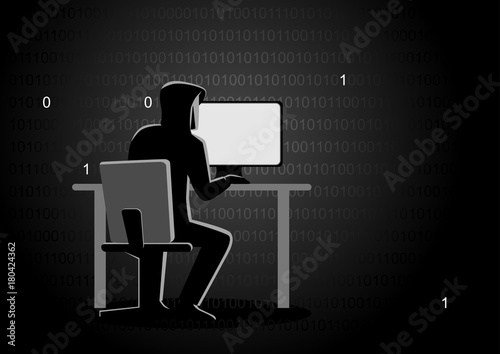 Hacker behind desktop computer
