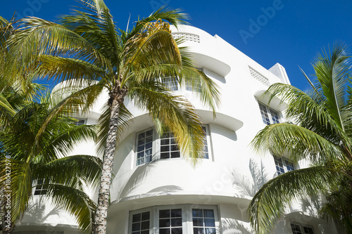 Classic 1930s art-deco era architecture and palm trees on Ocean Drive, Miami Beach.