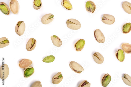 Pistachios isolated on white background, top view. Flat lay pattern