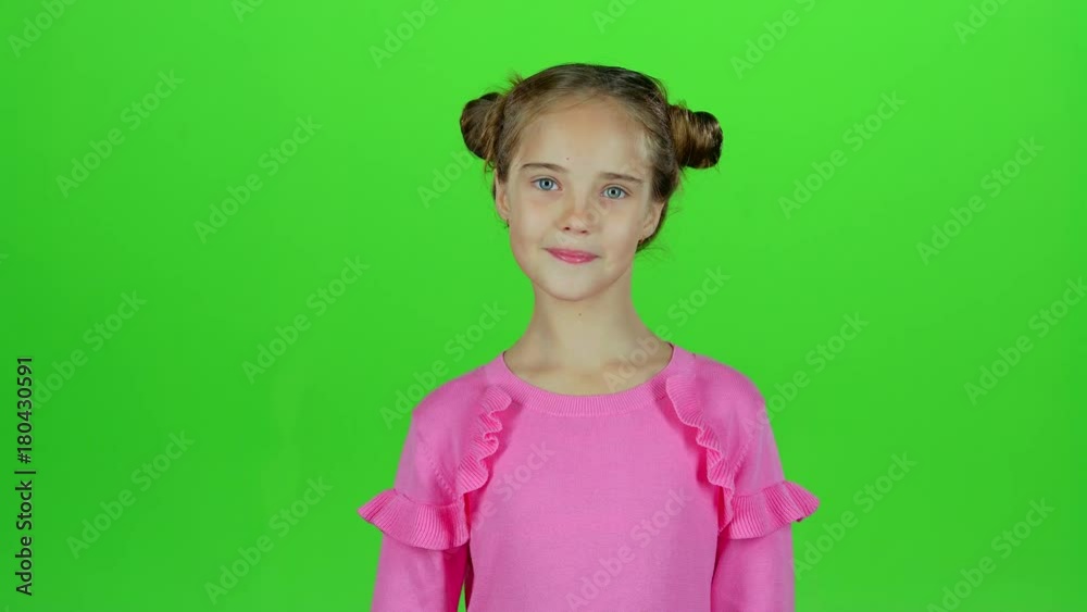 Baby shows thumbs up. Green screen. Slow motion Baby shows thumbs up. Green screen. Slow motion