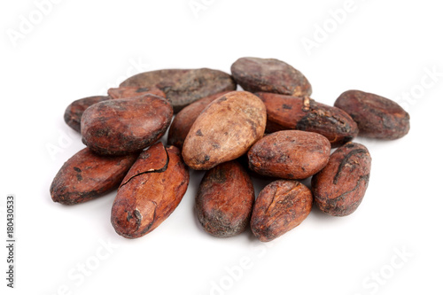 unpeeled cocoa bean isolated on white background macro top view
