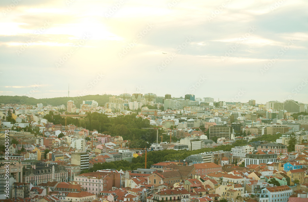 View of old city and modern city of Lisbon at sunset.