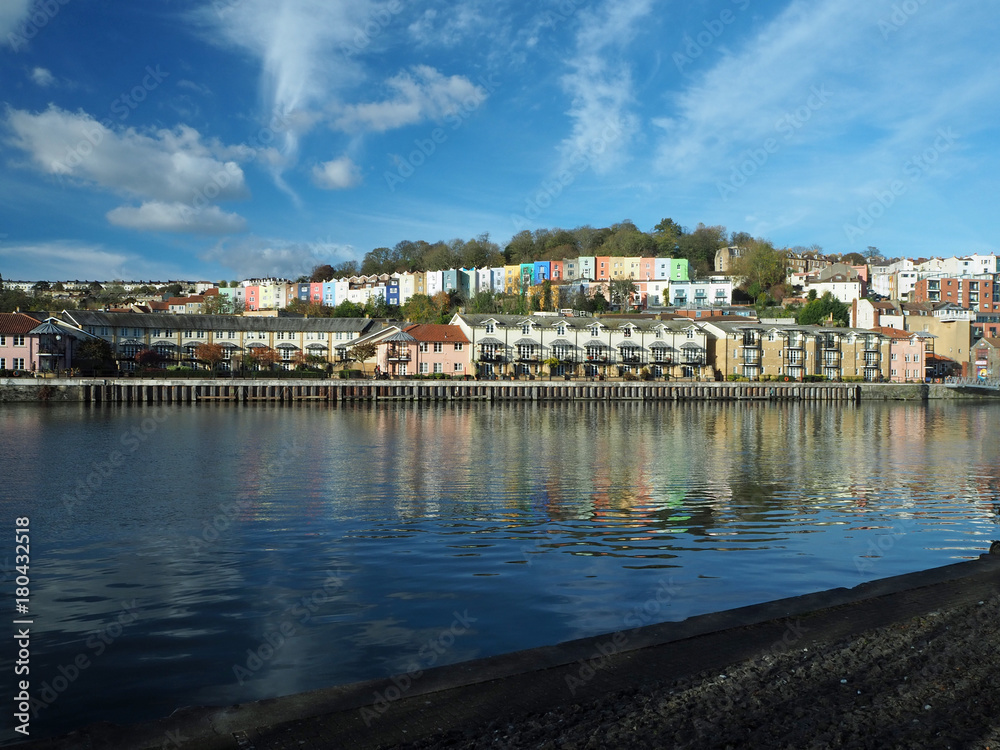 Bristol`s Harbourside and the colourful houses reflecting in the river