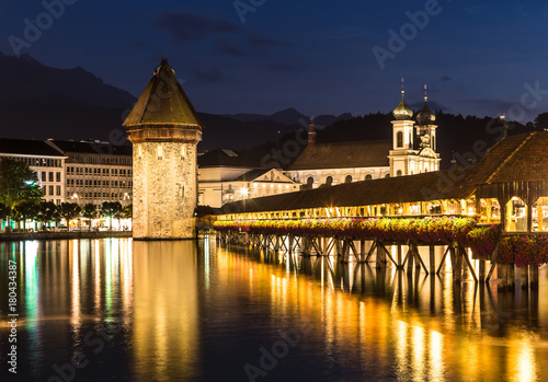 Famous wooden bridge in Lucerne at night in Switzerland