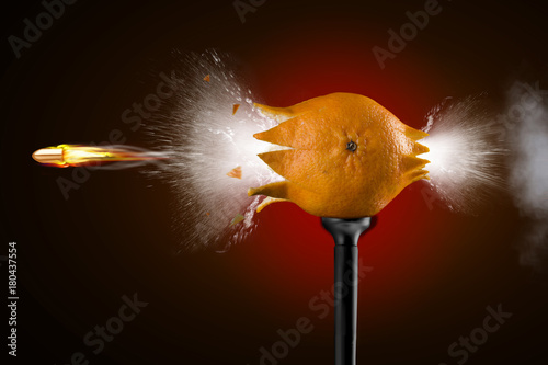 shot pistol tangerine spray splashes fire smoke black background sparks flight bullets speedy photographed imitation