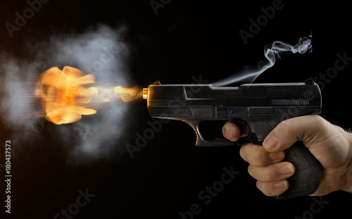 shot gun black fire smoke black background sparks flight bullets hand finger presses trigger