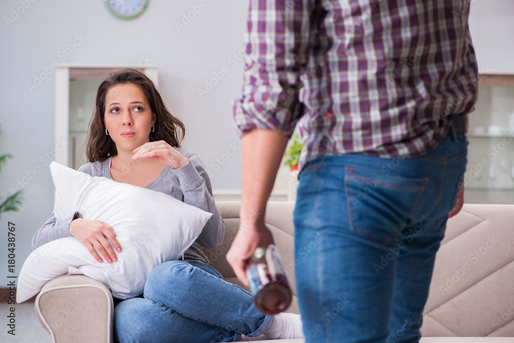 Domestic violence concept in a family argument with drunk alcoho Domestic violence concept in a family argument with drunk alcoho