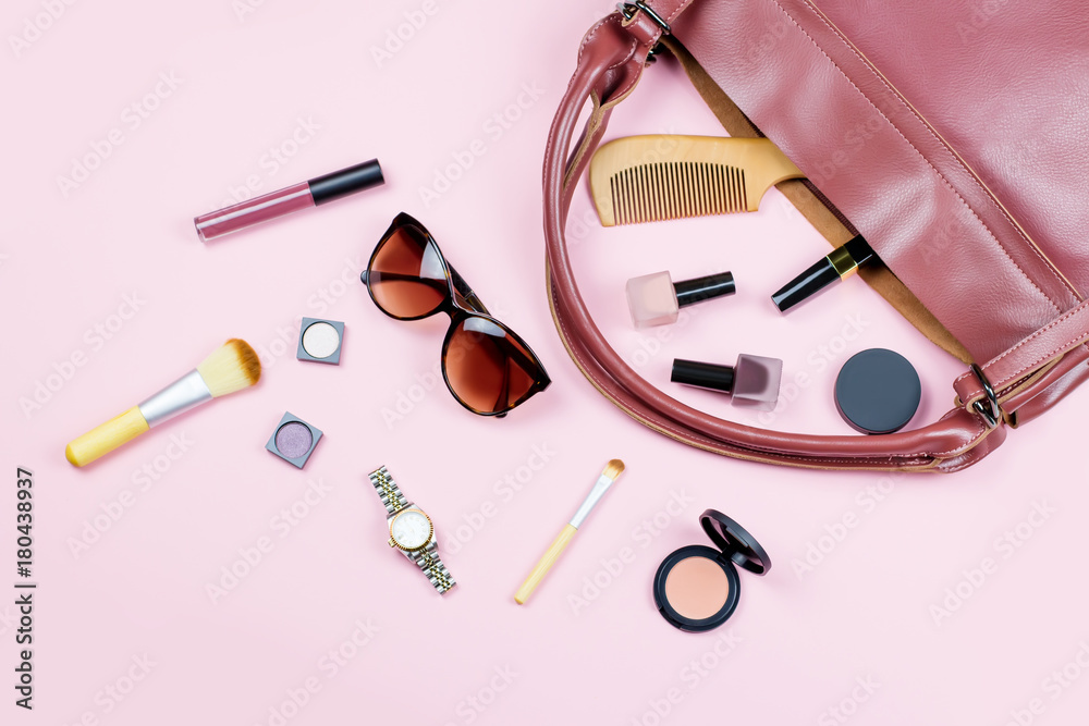Travel concept - woman fashion accessories, make up products, wristwatch, wooden comb, sunglasses. Travel concept - woman fashion accessories, make up products, wristwatch, wooden comb, sunglasses.