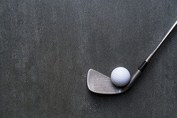 Acrylglasbilder Golf Golfball und Schläger auf Schwarz  © tatomm