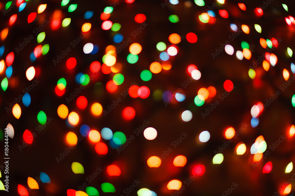Naklejka premium Color light blurred bokeh background, unfocused.