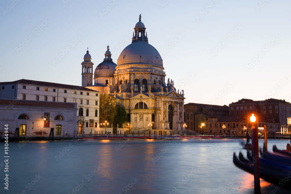 Cathedral of Santa Maria della Salute on the Grand Canal in September twilight. Venice, Italy