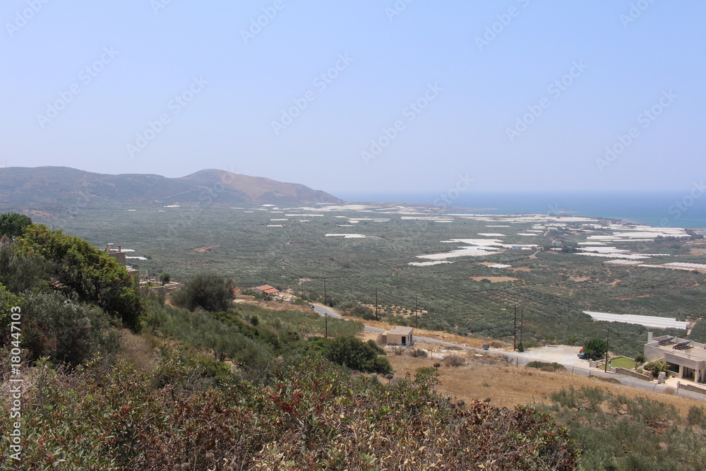 Obraz premium Panoramic view of beautiful Mediterranean sea and Falassarna Beach, taken from the top of the hill in western part of Crete island in Greece.