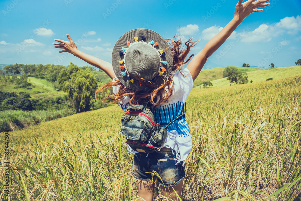 Asian women travel relax in the holiday. Stand natural touch mountain field. Thailand