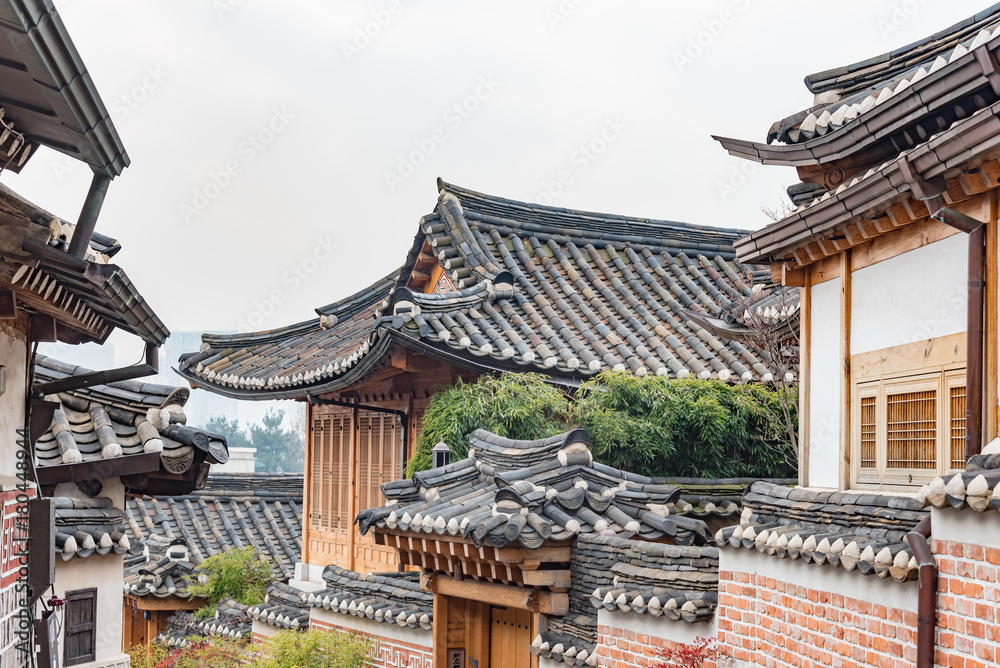 typical wooden pagoda houses in the metropolitan district of Seoul in South Korea typical wooden pagoda houses in the metropolitan district of Seoul in South Korea