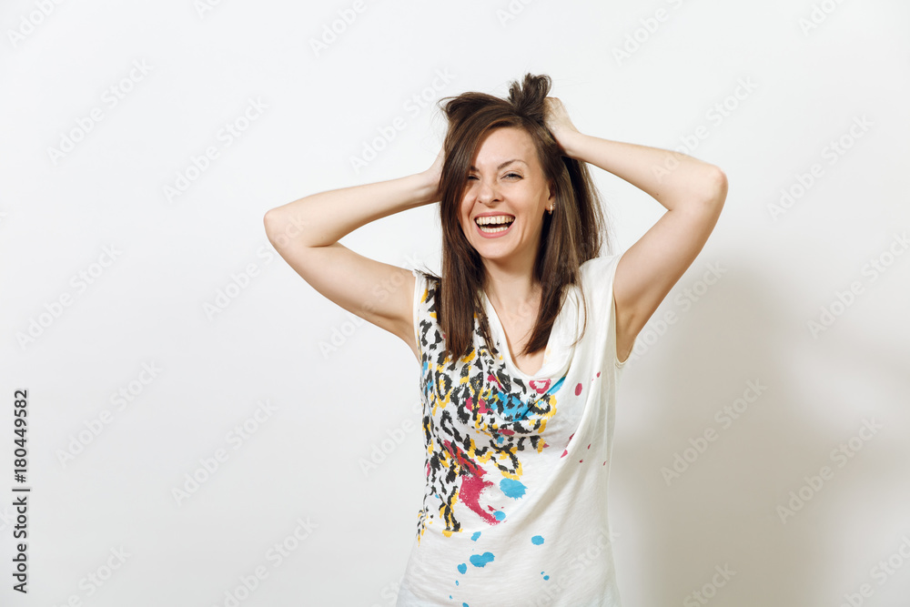 Beautiful European young funny and cheerful brown-haired woman with healthy clean skin, dressed in casual light clothes is fooling around at camera, on a white background. Emotions concept. Beautiful European young funny and cheerful brown-haired woman with healthy clean skin, dressed in casual light clothes is fooling around at camera, on a white background. Emotions concept.