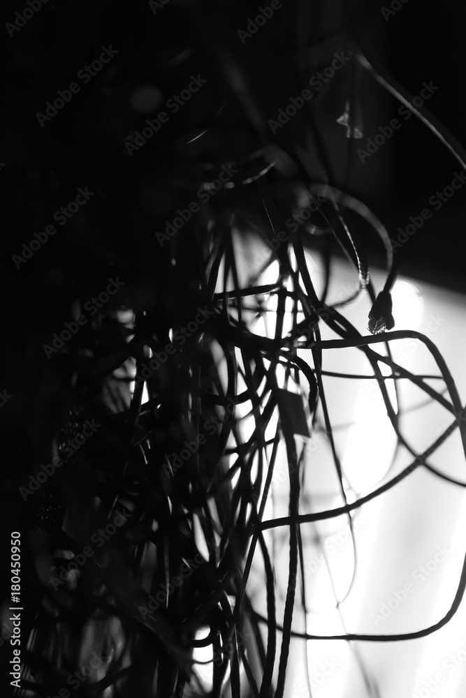 server room. A lot of different internet wires have a connection to computer servers. Black and white photo