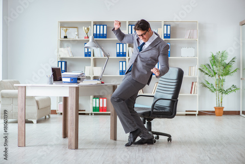 Bild auf Leinwand Businessman having fun taking a break in the office at work
