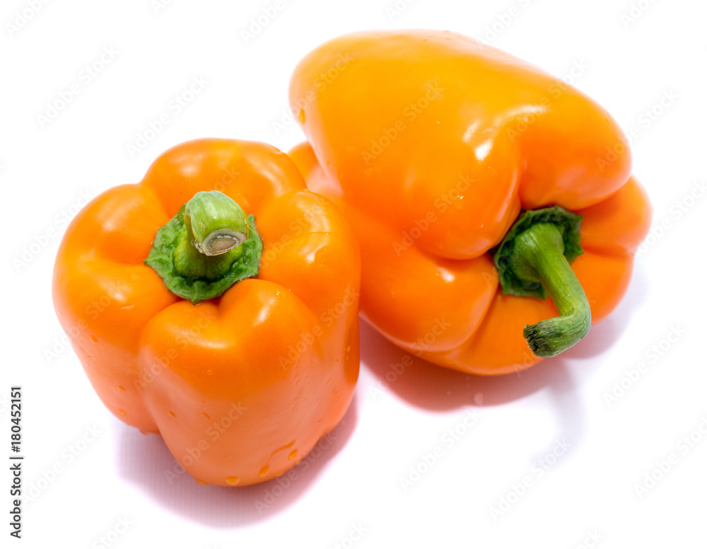 Group of orange peppers, one pepper on back, isolated on white background. Group of orange peppers, one pepper on back, isolated on white background.