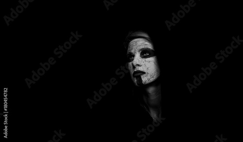 Portrait of a girl in a mystical makeover. The concept of black color. Black and white photography © Artem Markin