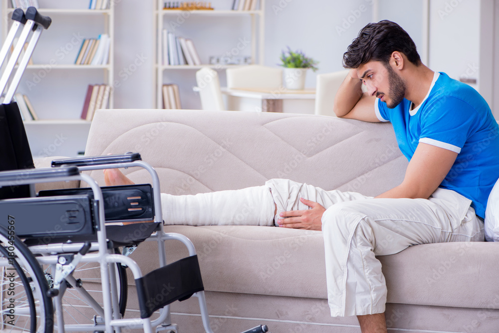 Injured young man recovering at home