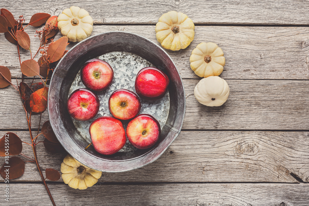 Metal basin with apples in water. Autumn harvest background Metal basin with apples in water. Autumn harvest background