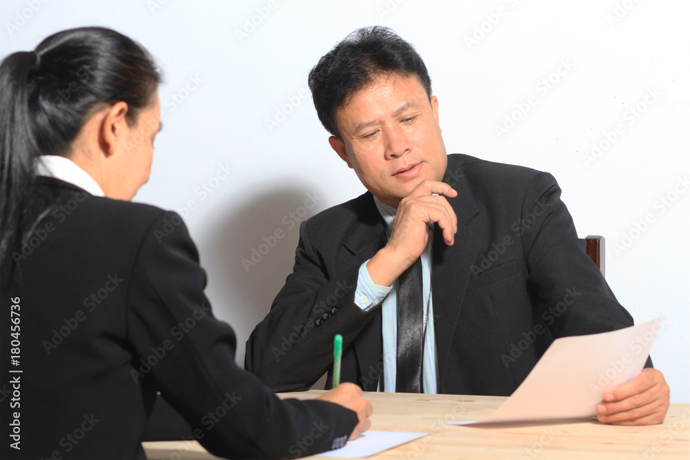 Business boss manager looking work secretary woman in office Business boss manager looking work secretary woman in office