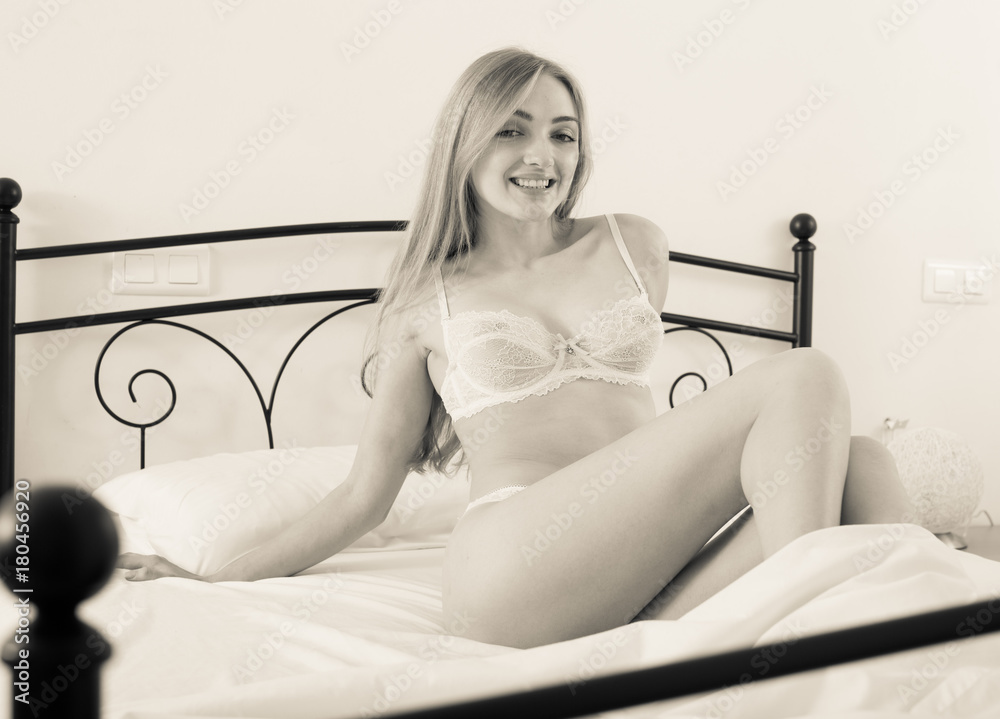 Beautiful girl in sexy semi-transparent lingerie. Toned foto de Stock |  Adobe Stock