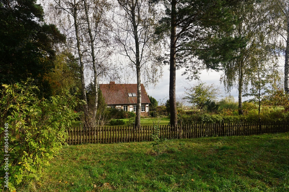 Old brick farm house with plants Old brick farm house with plants