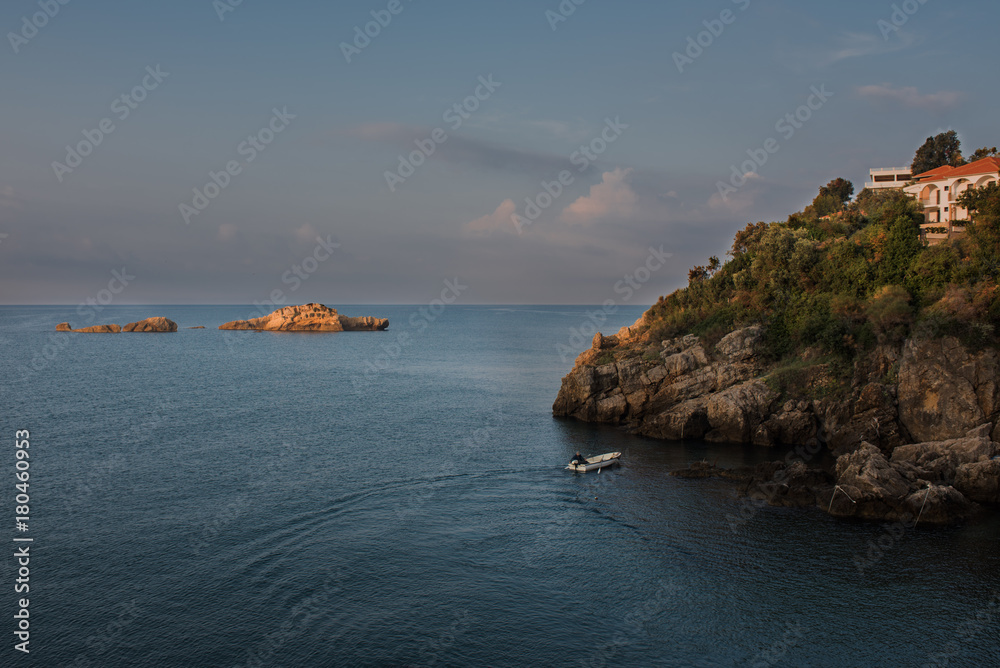 Montenegro, city of Ulcinj, the month of October, the Adriatic sea, morning, the boat with the fisherman.