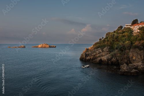 Montenegro, city of Ulcinj, the month of October, the Adriatic sea, morning, the boat with the fisherman. photo