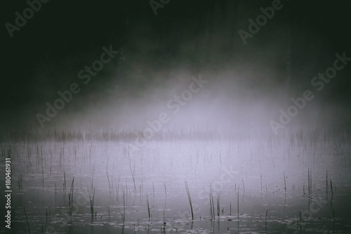 Early morning mist rising off a lake