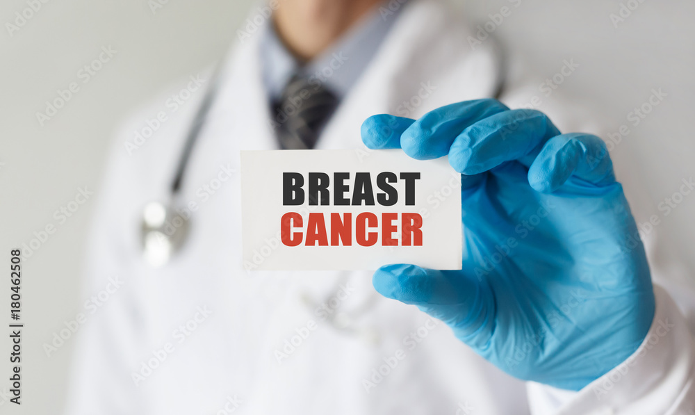 Doctor holding a card with text Breast Cancer ,medical concept Doctor holding a card with text Breast Cancer ,medical concept