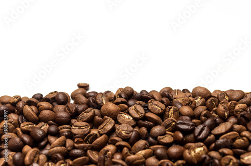 Roasted coffee beans isolated on white background  copy space