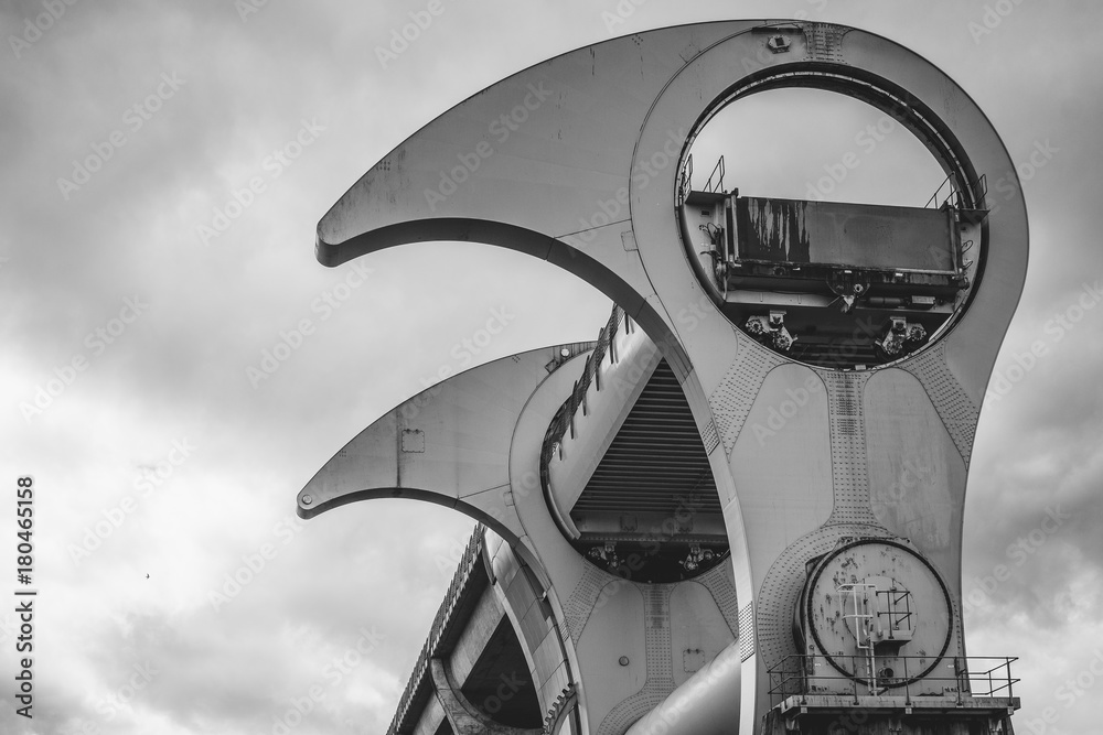 Close up detail of the Falkirk wheel in black and white on a cloudy gloomy day