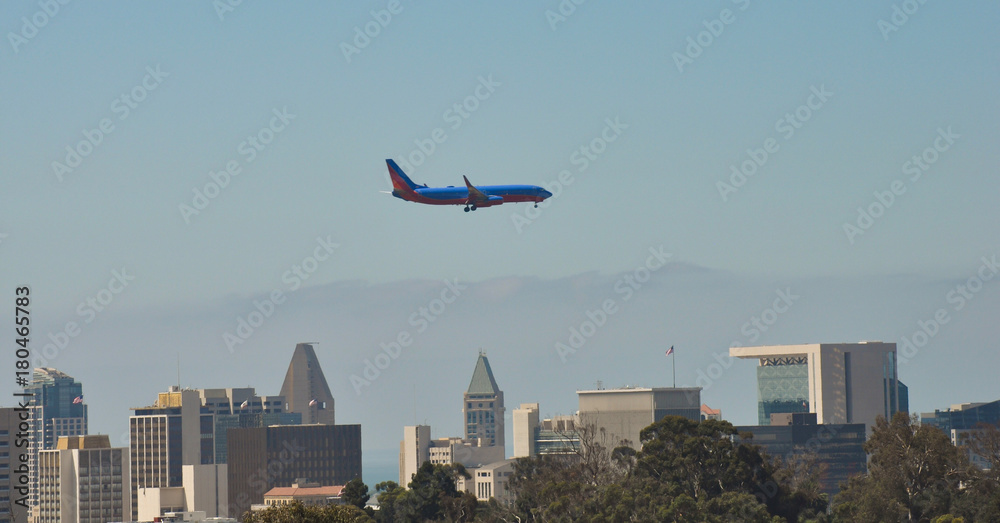 Airplane flying above city and is ready for landing. Airplane flying above city and is ready for landing.