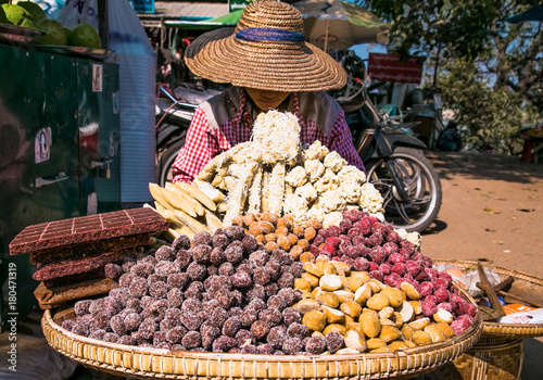 Street vendor selling sweet pastries in the  Old Bagan, Myanmar. photo