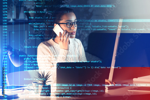 Young woman working with co...