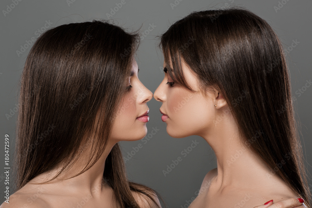 twins women with perfect skin and natural make-up twins women with perfect skin and natural make-up