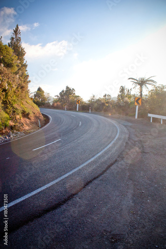 Curved street during sunset