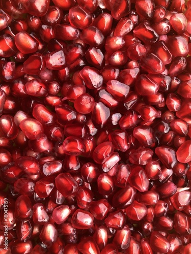 Juicy pomegranate garnet grains as a texture