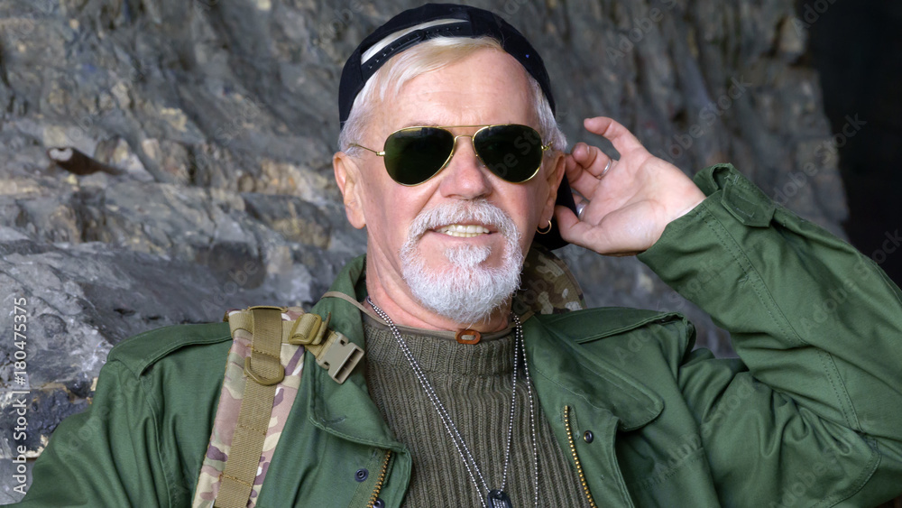 Fototapeta premium Portrait of confident elderly man