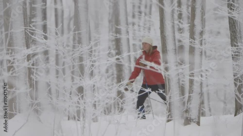 A skier gliding down a path