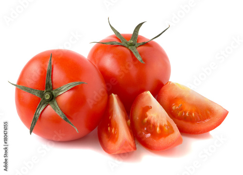 tomatoes with slices on white isolated background