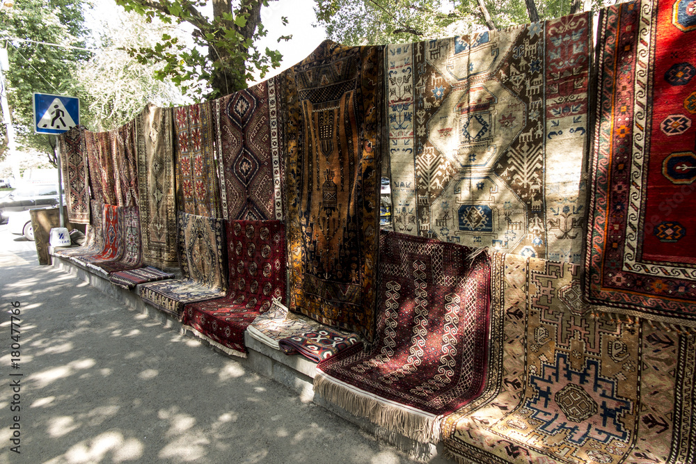 Sale of carpets at a bazaar in Yerewan