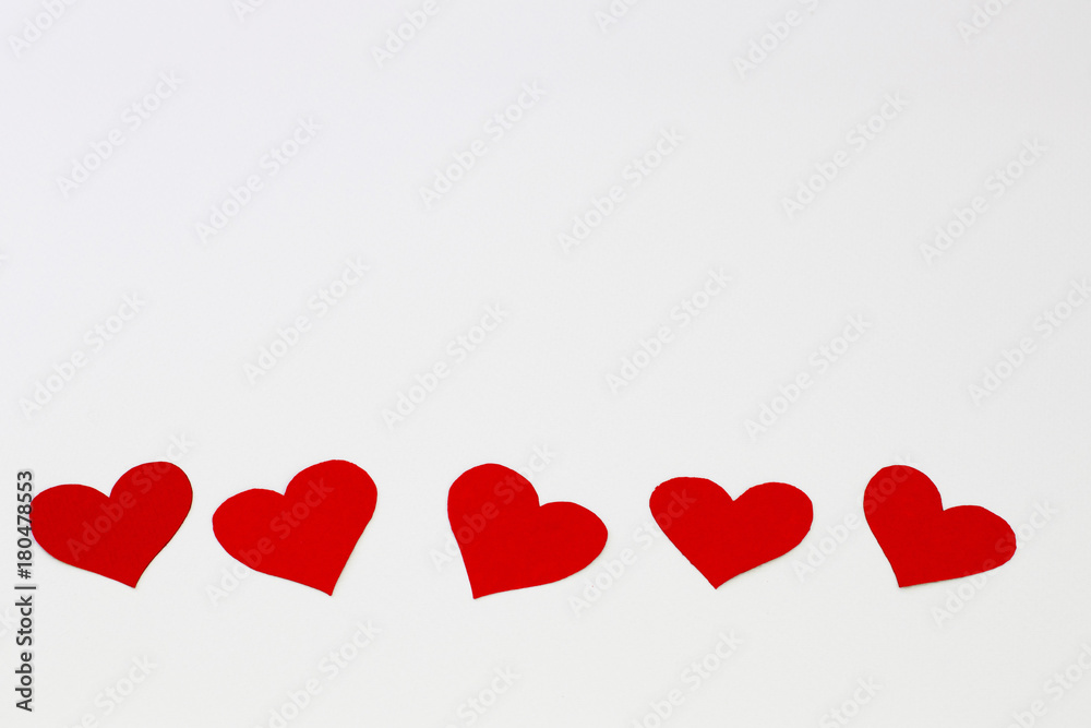 Set of red hearts with flat design on light background