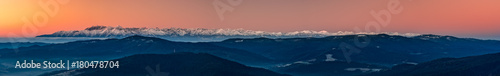 Tatra mountains panorama over misty Gorce mountains in the morning, Poland landscape