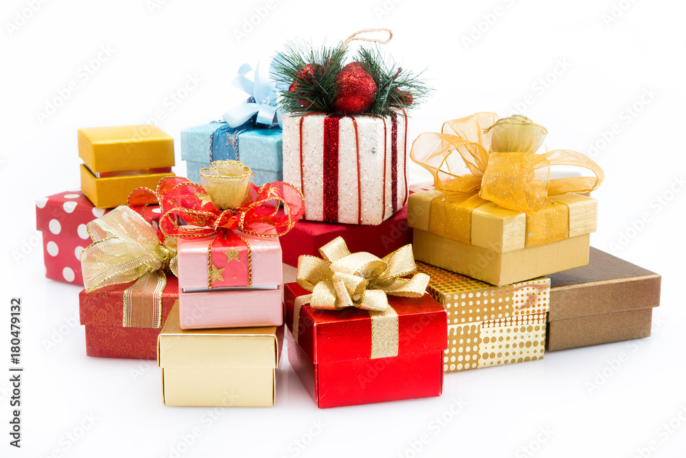 Pile of colorful gift boxes isolated on white background