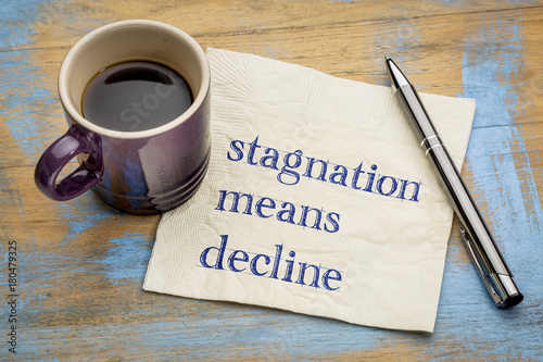 Stagnation means decline - napkin concept photo