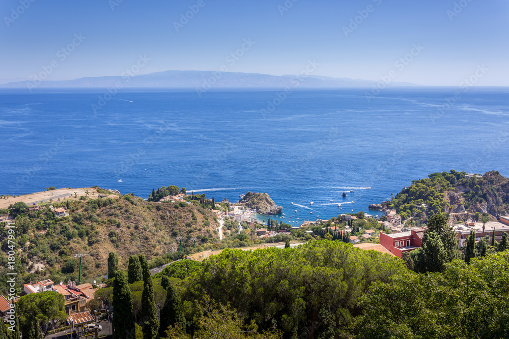 panorama of the coast of Ionian sea from greek theater in Taormina  in a summer day